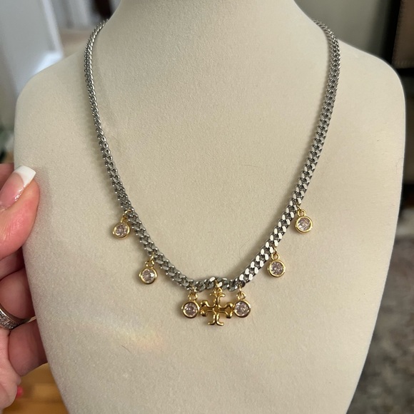 Tory Burch silver-tone chain & gold-tone charms with small crystals.